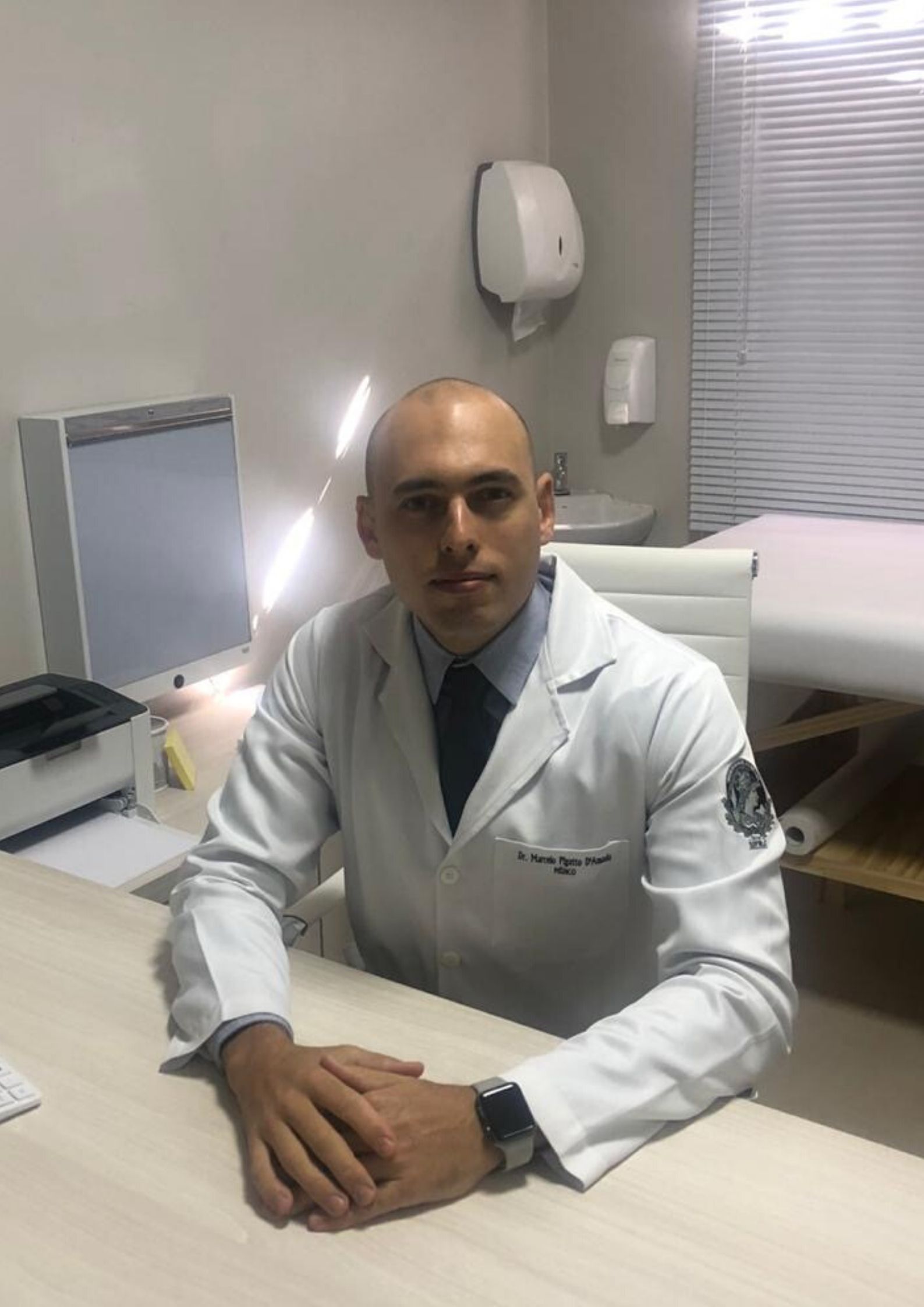 Dr. Marcelo Pigatto D' Amado